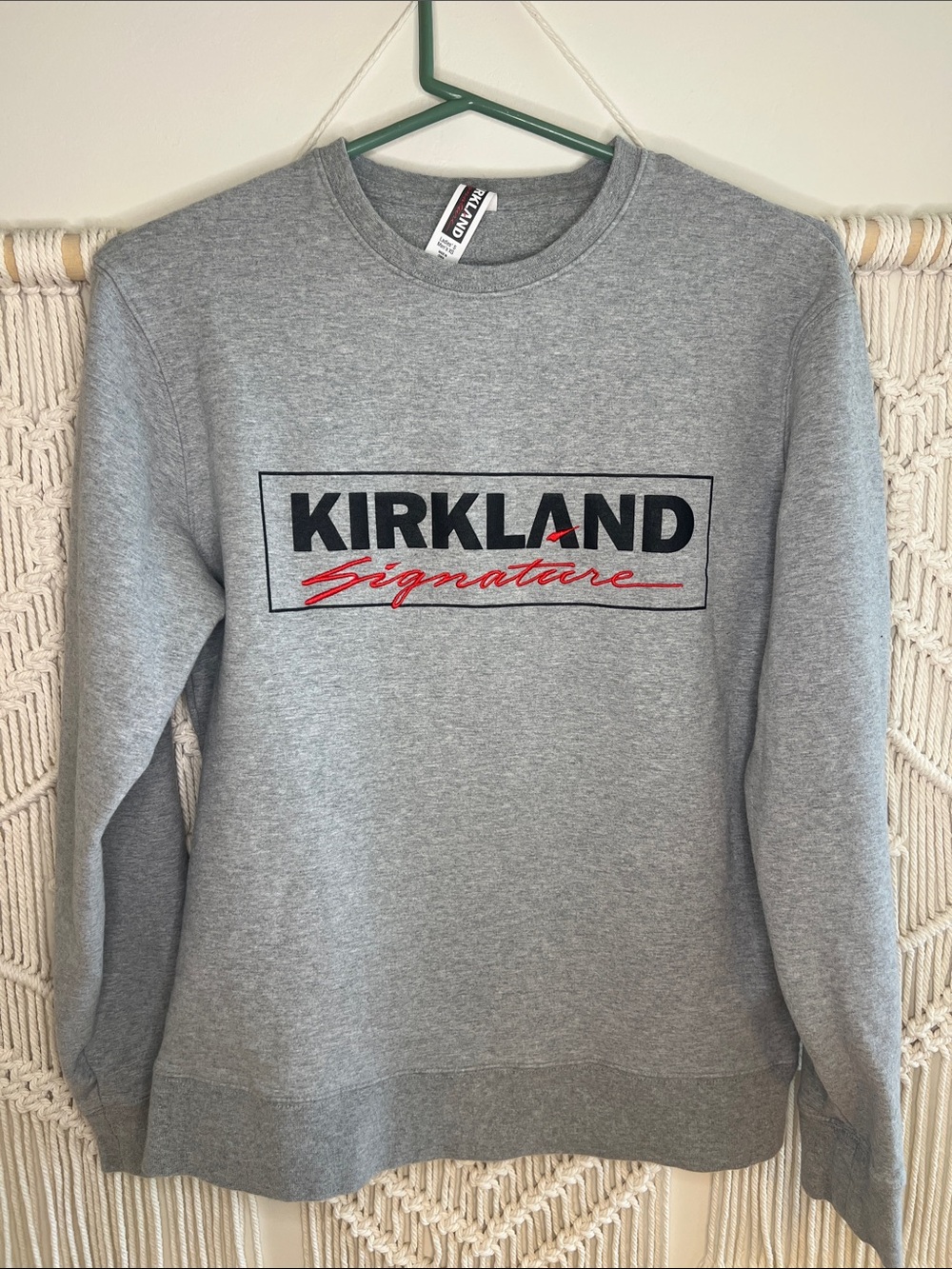 Kirkland Signature Grey Crewneck Sweatshirt with Black and Red Logo